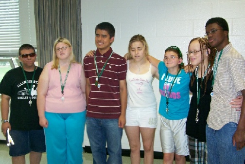 Evan, Cassy, Erick, Kortney, Emily-Ann, Shirlisa, and Julian take time out to pose for the camera.